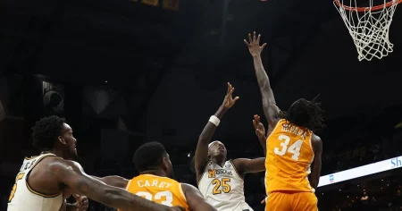 Missouri forward Mark Mitchell takes shot during game